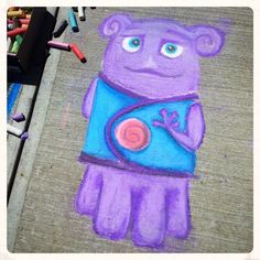 a drawing of a purple teddy bear holding a blue bag on the sidewalk next to crayons