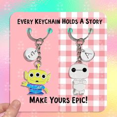 two keychains with the words make yours epic and an image of a cartoon character