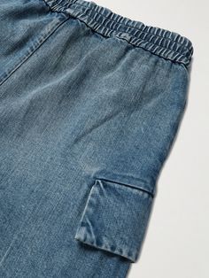 Fear of God's cargo trousers have been made in Japan from locally sourced vintage denim. They're cut relaxed and threaded with a drawstring. Denim Blue Cargo Pocket Rigid Denim Pants, Luxury Washed Blue Cargo Jeans With Pockets, Faded Washed Cargo Jeans In Rigid Denim, Faded Rigid Denim Cargo Jeans, Heron Preston White Jeans, Fear Of God Jeans, Fear Of God, Casual Trousers, Cargo Trousers