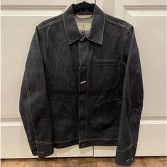 This Jacket Is In Excellent Condition With Hardly Any Signs Of Being Worn. Worn Only A Couple Of Times Dark Wash Selvedge Outerwear For Work, Classic Winter Outerwear With Selvedge Detail, Classic Winter Outerwear With Selvedge, Fall Selvedge Outerwear For Work, Classic Selvedge Dark Wash Outerwear, Denim Blue Outerwear With Double-needle Stitching, Long Sleeve Denim Outerwear With Double-needle Stitching, Denim Outerwear With Welt Pockets For Streetwear, Unstructured Denim Blue Outerwear For Workwear