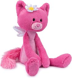 a pink teddy bear with a flower on its head and tail, sitting in front of a white background