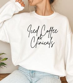 a woman wearing a white sweatshirt with the words red coffee and chicagos printed on it