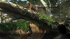 a giraffe standing on top of a fallen tree