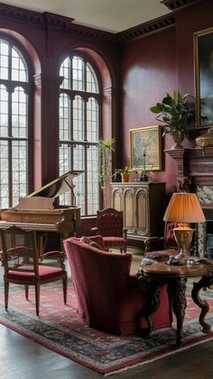 a living room filled with lots of furniture next to large windows and a grand piano