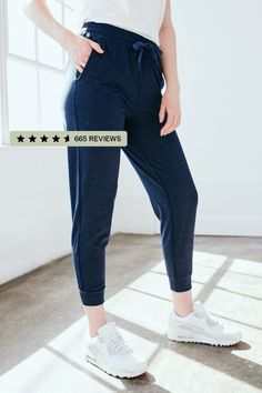 These women's performance joggers feature our ultra-soft Flowknit fabric. Featuring a slim but relaxed fit with the perfect amount of stretch for ultimate comfort. They'll be your new everyday pant.  | Quince | Women's Super Soft Performance Joggers in Navy, Flowknit Activewear, Recycled Polyester, Size XL Sporty Joggers With Cuffed Ankles, Sporty Everyday Activewear With Drawstring, Sporty Stretch Joggers With Cuffed Ankles, Relaxed Fit Joggers With Drawstring For Workout, Relaxed Fit Workout Joggers With Drawstring, Athleisure Stretch Joggers With Cuffed Ankles, Sporty Joggers With Relaxed Fit And Cuffed Ankles, Relaxed Fit Activewear With Drawstring For Jogging, Athleisure Joggers With Elastic Waistband And Cuffed Ankles