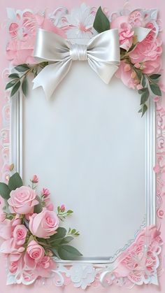 a white frame with pink flowers and a bow