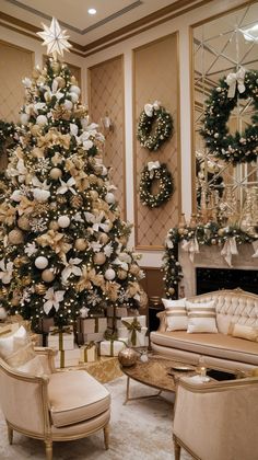 a living room decorated for christmas with white and gold decorations on the tree, couches and chairs