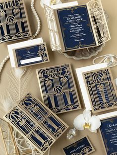 the wedding stationery is laid out on a table