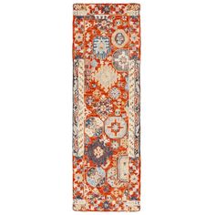 an orange, blue and white rug with many different designs on the bottom half of it