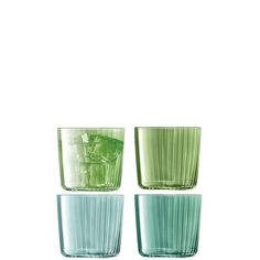 two green glasses sitting next to each other