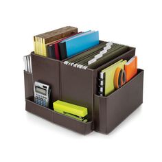 a brown leather desk organizer with office supplies in it