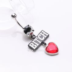 Risk-takers, stand out with this edgy Bitch Heart Sparkle Dangle Belly Button Ring. Featuring a heart-shaped charm with sparkling accents, this piece of body jewelry will take your style to the next level. Show off your wild side with confidence! Material: 316L Stainless Steel Size: 14 GA (1.6mm), 3/8" (10mm) Length: 2 inch (51mm) Width: 0.8 inch (20mm) Suitable for Navel Piercings It is always recommended to know your exact piercing size to ensure fitment, safety, and comfort. Please consult yo Navel Piercing, Belly Button Ring, Button Ring, Belly Rings, Belly Button, Fire Opal, Body Jewelry, Ear Piercings, Belly Button Rings