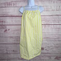 Nwt A New Day Spaghetti Strap Sun Dress. Yellow And White Stripe, Crisscross Ties In Back. 100% Cotton Size: Large St- Z Yellow Sundress With Tie Straps For Vacation, Yellow Sundress With Tie Straps, Yellow Sundress With Tie Straps For Summer, Yellow Sundress With Tie Straps For Brunch, Yellow Sleeveless Sundress With Tie Straps, Yellow Summer Dress With Tie Straps, Yellow Summer Dresses With Tie Straps, Yellow Beach Dress With Adjustable Straps, Yellow Sundress With Spaghetti Tie Straps