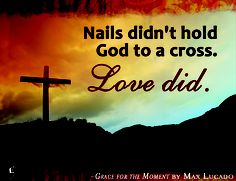 a cross with the words nails didn't hold god to a cross love did