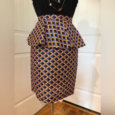 Ankara African Print Peplum Waist Slim Pencil Skirt Custom Handmade Brand New Without Tags! This Is A Beautiful Handmade Custom Tailored Skirt. One-Of-A-Kind Design! Color: Blue/Gold Multi Size: 10 (Approx. 30" Waist) Details: - Slim Pencil Skirt - Peplum Waist - Light Stretch - Rear Zipper - High Waist - Ankara African Print Detail - Knee Length - Bodycon Fit This Skirt Is Absolutely Beautiful! You Need It. Check The Other Listings In My Closet For More Fabulous Items And Make It A Bundle! Tailored Skirt, Handmade Brand, Custom Tailoring, Slim Waist, Design Color, African Print, Blue Orange, Ankara, Blue Gold