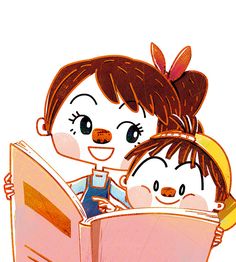 two children are reading a book together