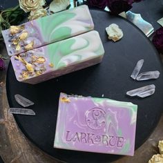 Haven soap, sanctuary in a bar of soap, crafted to envelop you in peace and safety. Immerse yourself in the soothing scent of lavender, green clover, and blonde woods, as each lather transports you to a refuge from the chaos of the world. The light purple soap, delicately swirled with pale green and white, evoke serenity. Topped with fragrant dried lavender and jasmine flowers, along with coarse salt crystals, Haven soap transforms your bathing routine into a sacred ritual of self-care. ✦ Crafte