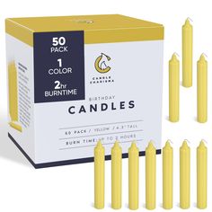 yellow candles are in a box with the top open