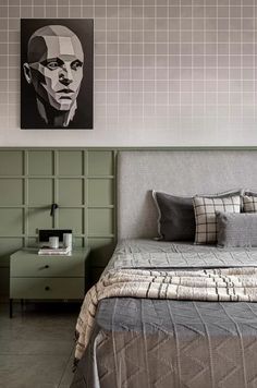 a bedroom with a bed, nightstands and painting on the wall above it's headboard