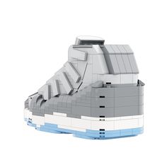 a pair of sneakers made out of legos on a white surface with blue accents