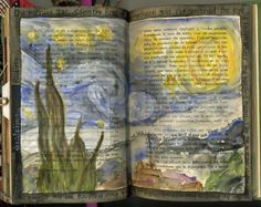 an open book with some drawings on the pages and watercolors painted inside it