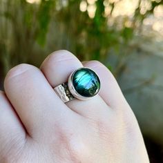 Ring Size: 57 ( 8 US ) / Adjustable (For other ring sizes, please ask) Main Precious Stone: Labradorite Weight (gr): 12 📌 Our products are made from 925 STERLİNG SİLVER, as indicated by the stamps, and contain no allergenic substances such as nickel and lead, making them hypoallergenic. 📌 Our products are all completely HANDMADE, with no molds used. In products with natural stones, only one piece is produced because each stone is unique. The sizes of some of our products can be customized; sim Labradorite Birthstone Rings As A Gift, Labradorite Birthstone Rings For Gifts, Round Labradorite Ring As Gift, Nature-inspired Sterling Silver Cabochon Ring, Nature-inspired Cabochon Ring For Anniversary, Handmade Green Labradorite Rings, Labradorite Rings Stamped 925 For Anniversary, Handmade Labradorite Crystal Ring For Anniversary, Anniversary Labradorite Rings Stamped 925