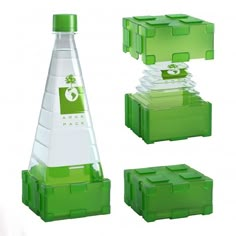 a green plastic container with two separate compartments and one empty bottle in the middle, on a white background