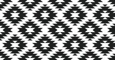 an abstract black and white background with many small triangles in the center, all on one side