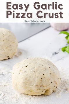 two pizza crusts sitting on top of a white counter next to each other with text overlay that reads easy garlic pizza crust