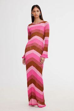 Gabriela Maxi Dress in Floss Stripe Pink from Significant Other. A stand out from the collection ~ the Gabriela Maxi Dress in Floss Stripe is designed to flatter the feminine form. Crafted from a soft knit fabrication, complimented with ruffled bell sleeves, curved neckline and back tie detail with resin beads. A Stand, Resin Beads, Significant Other, British Indian, Soft Knits, The Collection, Bell Sleeves, Long Dress, Maxi Dress