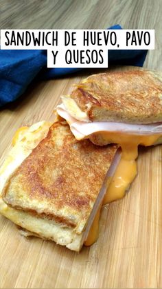 a grilled cheese sandwich with ham and melted cheese