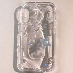 a plastic case with an image of a man and cat in the water on it