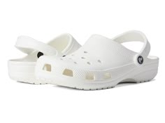 Crocs Classic Clogs - Clog Shoes : White : Please note this style runs in whole sizes only. For customers that are a half size, the brand recommends ordering a half size smaller than your normal shoe size. To continue their support for the LGBTQ community, Crocs is donating to GLAAD, the leading media advocacy organization working to accelerate LGBTQ acceptance. This durable, non-skid, multi- purpose clog is popular to water-sports enthusiasts, hikers, medical professionals, food service workers Comfortable White Clogs With Rubber Sole, White Comfortable Synthetic Clogs, Classic White Round Toe Clogs, Classic Non-slip Slip-on Clogs, Classic White Clogs With Cushioned Footbed, Classic White Closed Toe Clogs, Classic White Clogs With Rubber Sole, White Closed Toe Clogs With Arch Support, Sports White Clogs With Cushioned Footbed