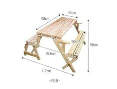 a wooden picnic table with measurements for it