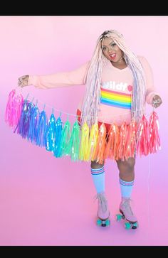 a woman wearing roller skates and colorful hair