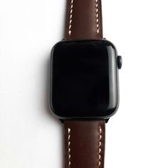 APPLE WATCH NOT INCLUDED. Premium cracked leather apple watch band. Handcrafted in Indonesia by experienced custom watch strap maker for high-end watches. Designed to give your Apple Watch a masculin, bold new look. Made from finest vintage cracked leather. Compatible for apple watch series 1,2,3, 4, 5, 6, 7 and SE Available size : 38mm 40mm 41mm 42mm 44mm 45mm Materials Cowhide for upper Goatskin leather for lining 316 stainless steel hardware  Technical Strap is one size fits most, designed for wrist sizes ranging from 160mm to 180mm 75 mm length (buckle side) and 125mm length (adjustment side) Modern Brown Watch Band For Business, Brown Leather Strap Apple Watch Band, Modern Brown Watch Accessories With Waxed Finish, Modern Brown Rectangular Apple Watch Band, Business Brown Bracelet Strap Apple Watch Band, Classic Brown Apple Watch Band For Business, Modern Brown Apple Watch Band As Gift, Modern Brown Watch With Wrist Strap, Apple Watch Leather Strap