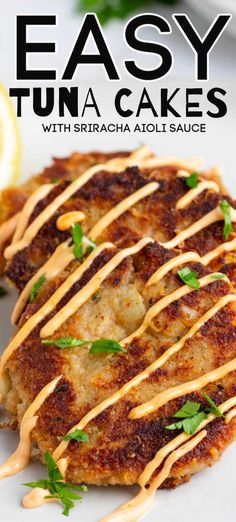 an easy tuna cakes with sriracha aioli sauce on top and lemon wedges