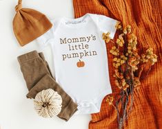 "Mommy's Little Pumpkin Baby Onesie® ❣️HOW TO ORDER -Choose your size and style from the drop down menus (available sizes and styles are listed in the photos) -If you would like it to say something other than \"Mommy's\", please include that in the personalization box -Add listing to your cart -Double check your address and make sure it is correct when going through checkout ✨IMPORTANT ONESIE® INFO I use Gerber onesies®. If the size and style you order is out of stock, I will do my best to fill Fall Onesies, Fall Onesie, Pumpkin Onesie, Fall Bodysuit, Fall Pregnancy Announcement, Navy Christmas, Halloween Onesie, Canvas Mockup, Fall Maternity