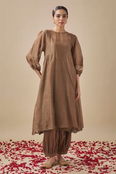 Brown puffed sleeves side gathers anarkali with pintucks on the side, lace and sequin embellishments on the neckline and sleeves hem. Paired with a gathered salwar pant and an inner. - Aza Fashions Sleeves For Kurti, Reception Kurta With Embroidered Long Sleeves, Kurta With Embroidered Sleeves For Reception, Elegant Diwali Dresses With Embroidered Sleeves, Elegant Dresses With Embroidered Sleeves For Diwali, Fitted Anarkali Set With Embroidered Sleeves, Festive Fitted Anarkali Set With Embroidered Sleeves, Traditional Drape Dresses With Embroidered Sleeves For Eid, Eid Dresses With Embroidered Sleeves And Traditional Drape