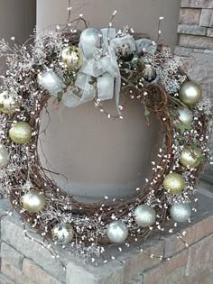 an image of a wreath with white and silver ornaments on it, surrounded by other photos