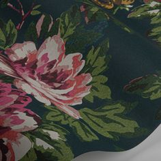 an image of a flowered fabric with green and pink flowers on the back side