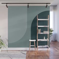 a living room with blue and white wallpaper, wooden flooring and ladders