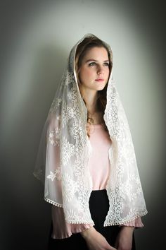 "An incredibly soft and light veil, in ivory or black (photos soon). Please select color at checkout! Thank you to our dear customer for sharing the photos (last 2 photos) of her sweet daughter's Confirmation. May God bless her! For your consideration, one new Chapel Veil or Mantilla,tapered rectangle wrap style mantilla, or chapel veil, measures about 68 X 23 inches. Wear as scarf or wrap, and simply slip up to cover head. Lovely and very soft embroidered lace in soft floral lace has a slight s Veil Mantilla, Black Photos, Lace Mantilla, Veiled Woman, Floral Wreath Design, Beautiful Veil, Chapel Veil, Lady Of Fatima, Black Veil