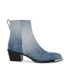 ELEVATED + EDGY + SMART The RICHIE boot pairs an angled block heel with an ankle-height upper for an updated washed denim western-inspired look. Heeled ankle boot Zipper closure at side Metal boot tip on toe Angled stacked heel 2.5 inch heel height 11.5 inch shaft circumference 6 inch shaft height Textile upper material Synthetic lining Synthetic sole Imported Western Style Denim Blue Boots For Fall, Western Denim Blue Boots For Fall, Denim Blue Western Boots For Fall, Denim Blue Pointed Toe Denim Boots, Western Denim Boots With Round Toe, Western Denim Boots, Trendy High Ankle Denim Boots, Trendy Denim Ankle-high Boots, Trendy Ankle-high Denim Boots