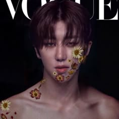 a man with flowers on his face and chest is featured in the cover of a magazine