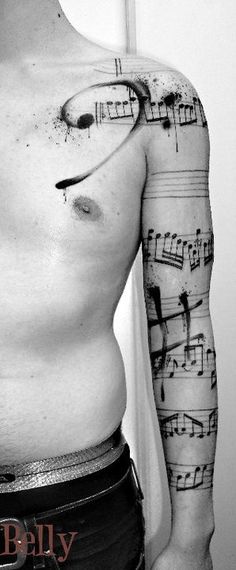 a man with musical notes on his chest