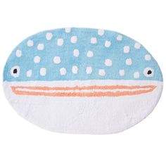 a blue and white fish rug with polka dots on the bottom, in front of a white background