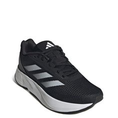 Energize your fast stride with these women's Adidas Duramo SL core black/cloud white/carbon running shoes. Crafted with mono mesh upper containing at least 50% recycled content, these athletic sneakers have a round toe and optimal laced-up closure. Along with 3-Stripes detail ath the quarter for sporty iconic vibes, features include breathable textile lining, a LIGHTMOTION firm EVA blend foam cushioned midsole offering lightweight comfort, stability, and high response, and a thick, durable Adiwe Black Clouds, Shoe Company, Athletic Performance, Cloud White, Boots And Sneakers, Slipper Boots, Athletic Sneakers, Kids Boots, Running Shoe