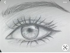 a drawing of an eye with long eyelashes