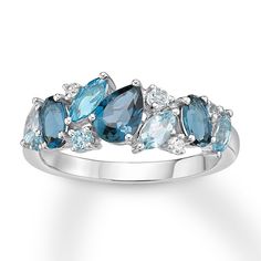 This entrancing ring for her is embellished with a collage of vibrant shades of blue and white topaz stones. The band is styled in sterling silver. Chocolate Diamond Ring Engagement, Hammered Silver Jewelry, Silver Jewelry Box, Cleaning Silver Jewelry, Silver Rings With Stones, Silver Jewelry Design, Silver Jewelry Pendant, Silver Jewelry Rings, A Collage